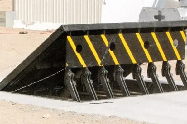 A close up of the side of a road with a ramp