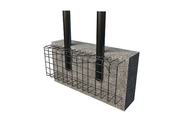 A concrete block with two metal poles attached to it.